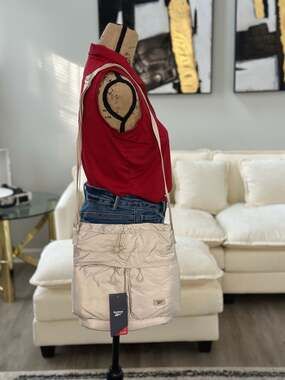 Reebok Elaine Cream Puffer Crossbody Bag with Bungee Drawstring Details